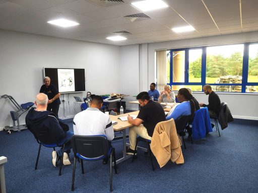 A photo of a training session taking place in one of the training rooms for hire.