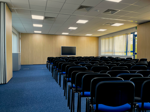 A photo of a large theatre layout in a combined meeting room