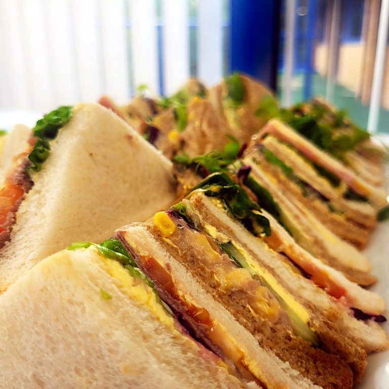 A close up of sandwiches on a sandwich platter