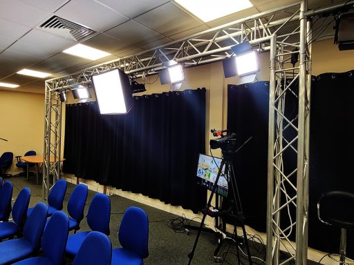 A photo of the blackout curtains drawn in the film studio to block out the light.