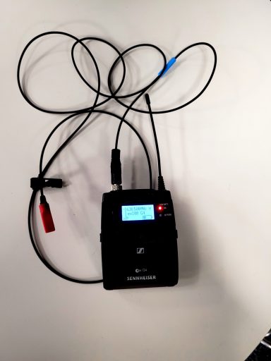 A photo of a Sennheiser Lapel microphone used in the studio.