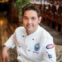 Photo of professional chef and caterer, Dean Light, in chef whites.