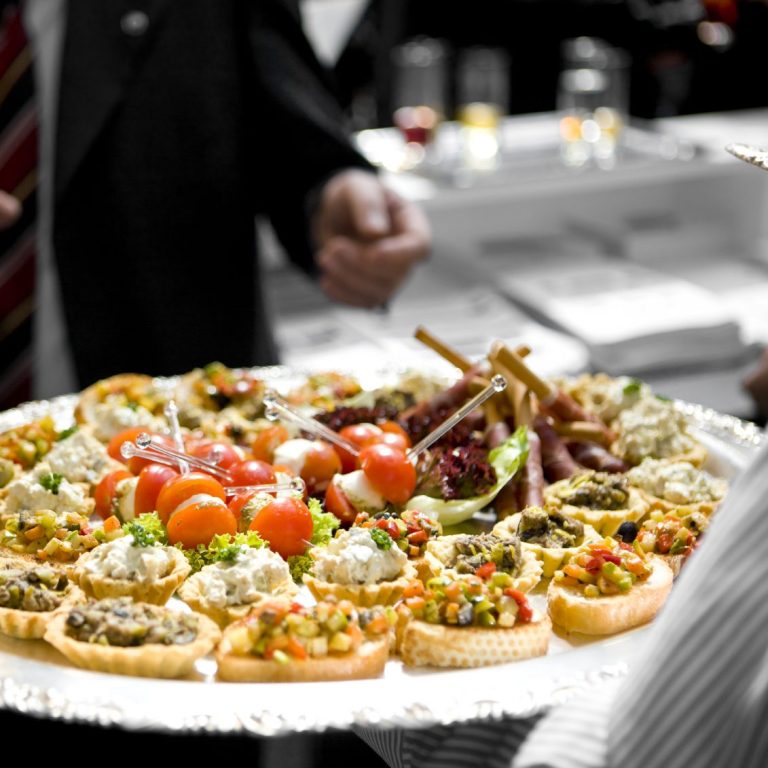 A photo of various foods in a buffet